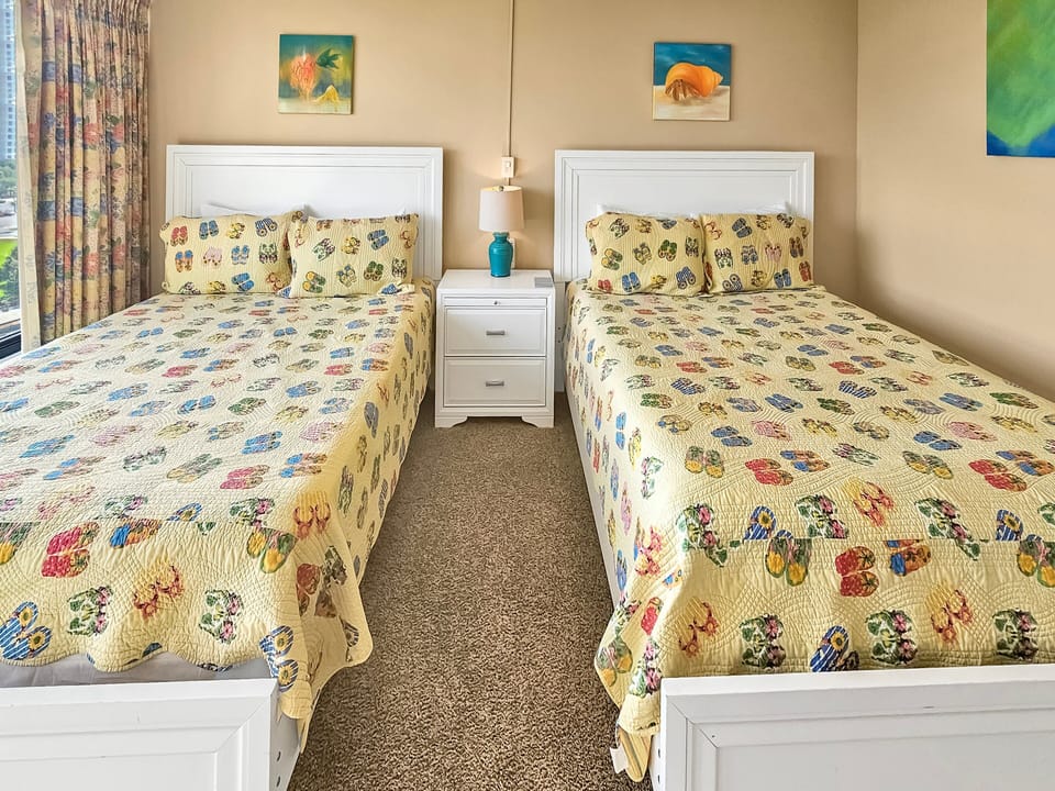 Two queen beds in spacious third bedroom