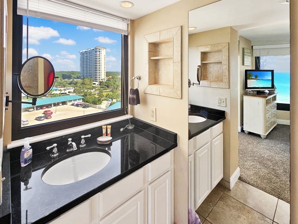 Remodeled master bathroom with separate vanity area
