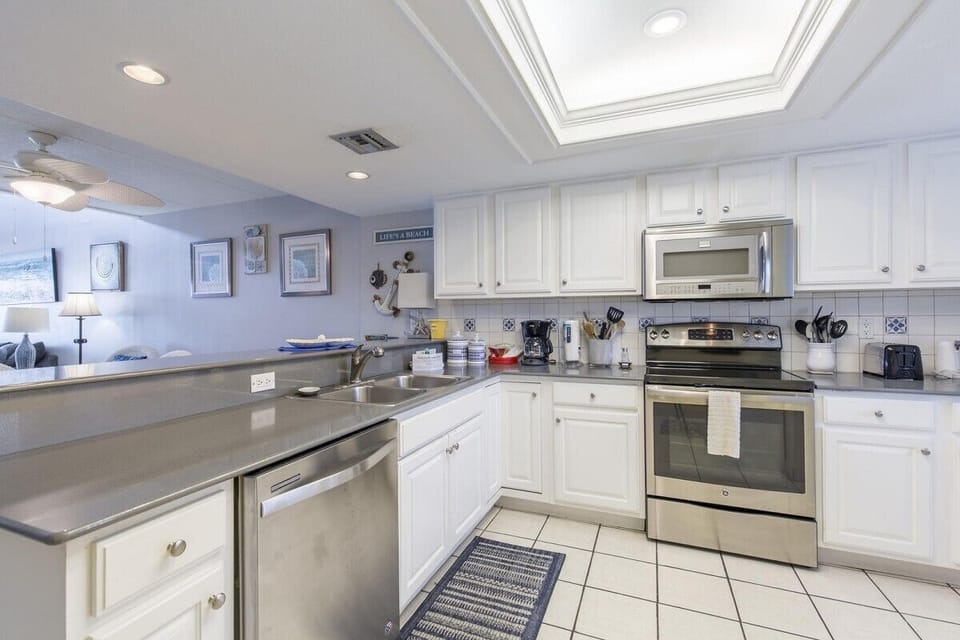 Fully stocked kitchen with standard coffee maker