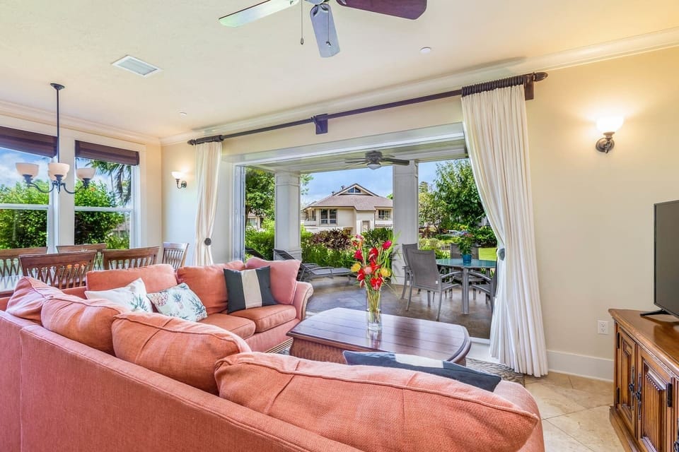 Enjoy the tropical ocean air from inside the villa with the folding lanai doors.