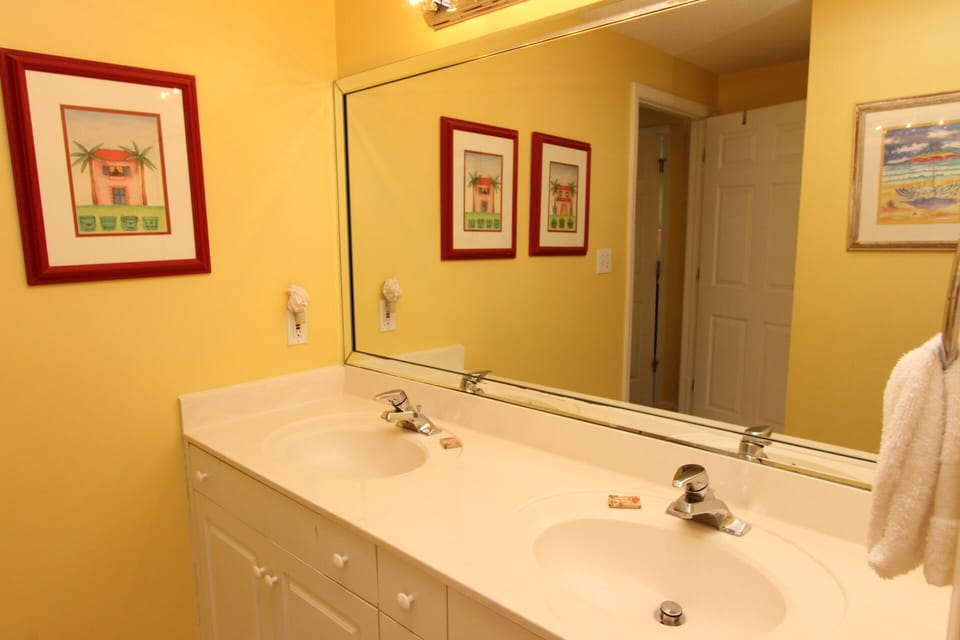 Private master bath with double vanity.