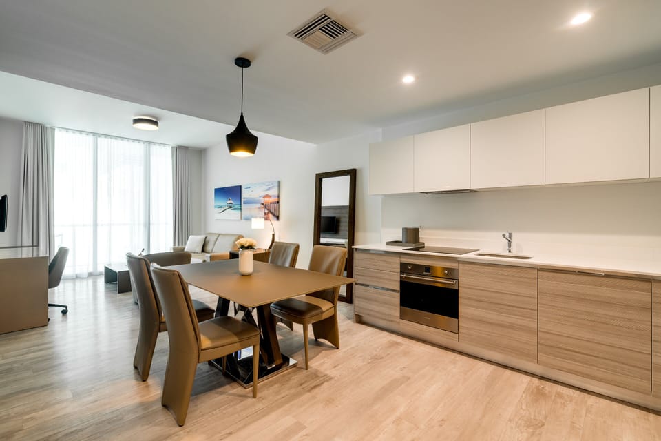 One Bedroom Suite King with Balcony | Living area | 39-inch flat-screen TV with cable channels, TV