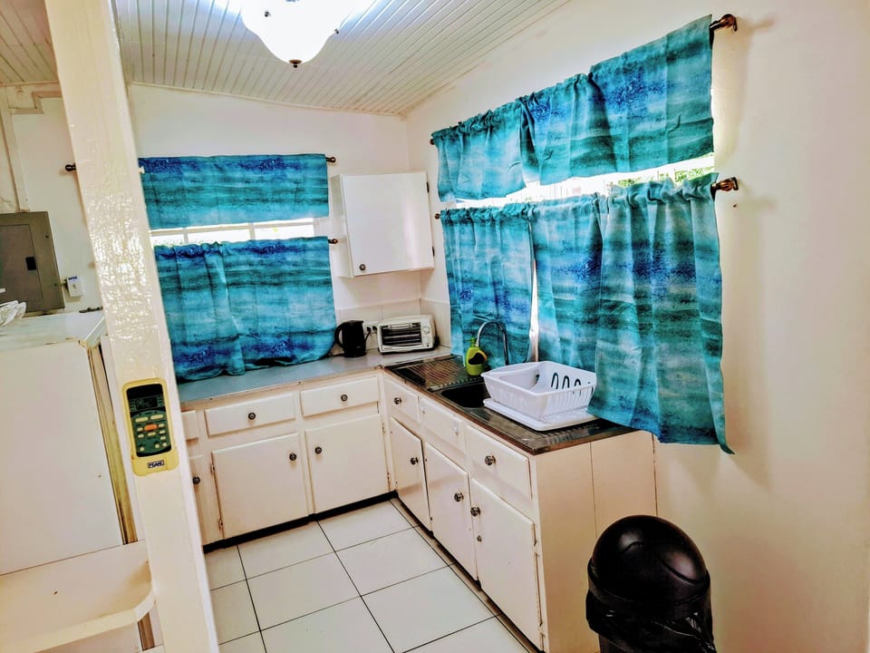 Cottage, Multiple Beds, Kitchen | Private kitchen | Coffee/tea maker, fridge, microwave, oven