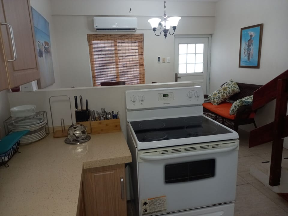 Coffee/tea maker, fridge, microwave, oven