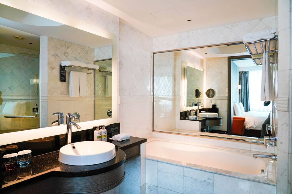 Separate tub and shower, deep soaking tub, designer toiletries