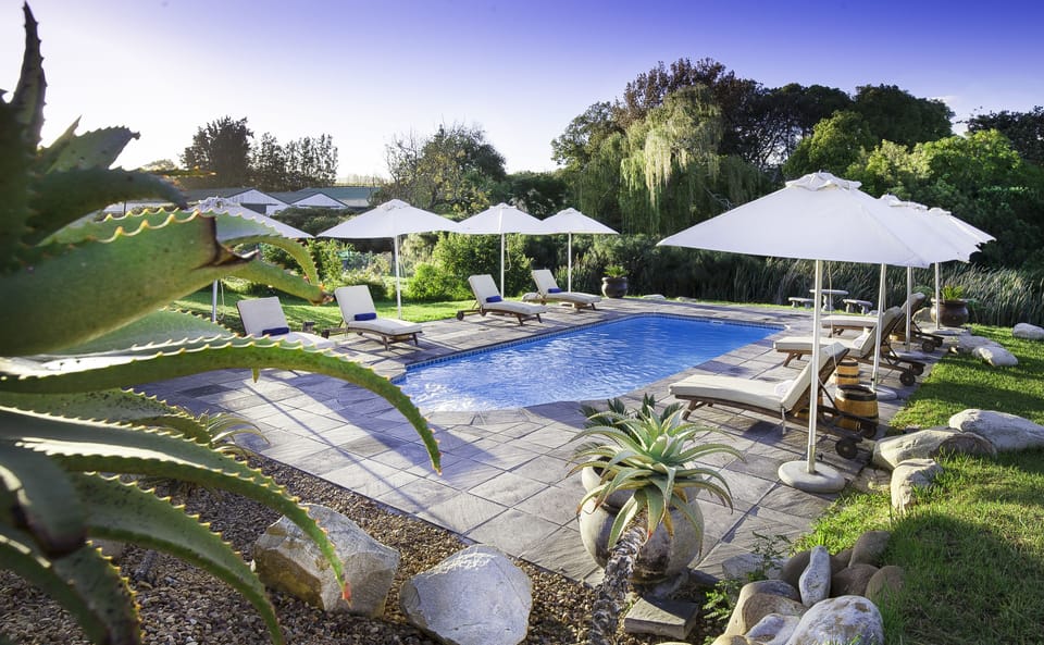 2 outdoor pools, pool umbrellas, sun loungers