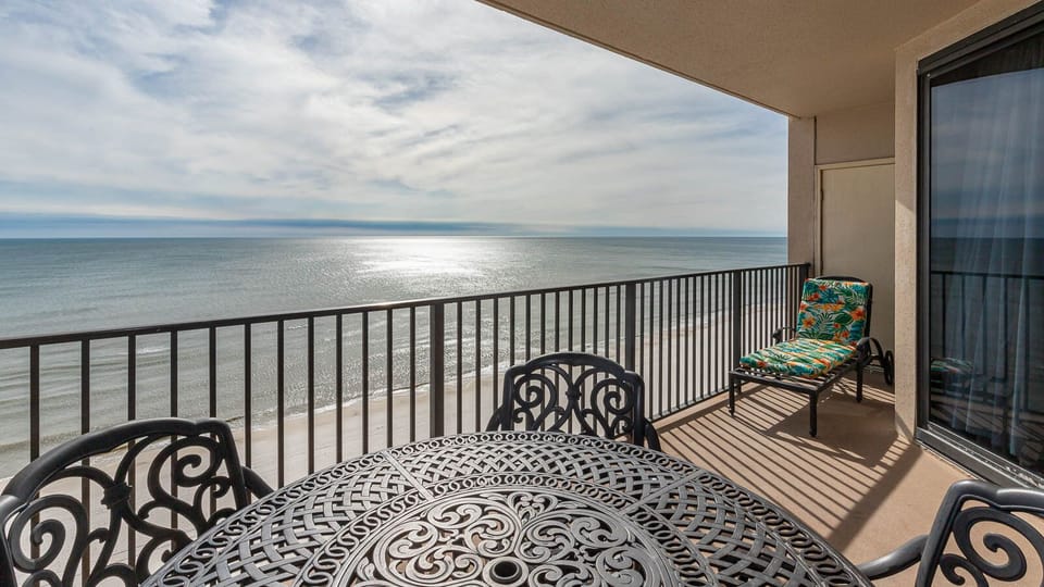 Savor your morning coffee at the round table while enjoying the expansive views of the tranquil waters