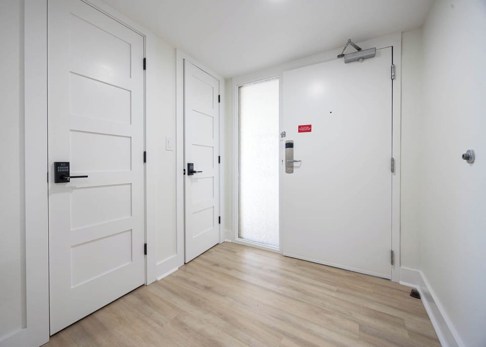 Large entry-way with plenty of closets for all the pool and beach gear
