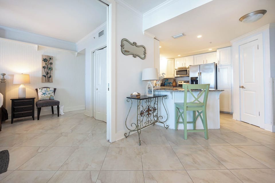 Step into a welcoming space featuring a stylish kitchen area and a cozy seating nook in the master, perfect for relaxation