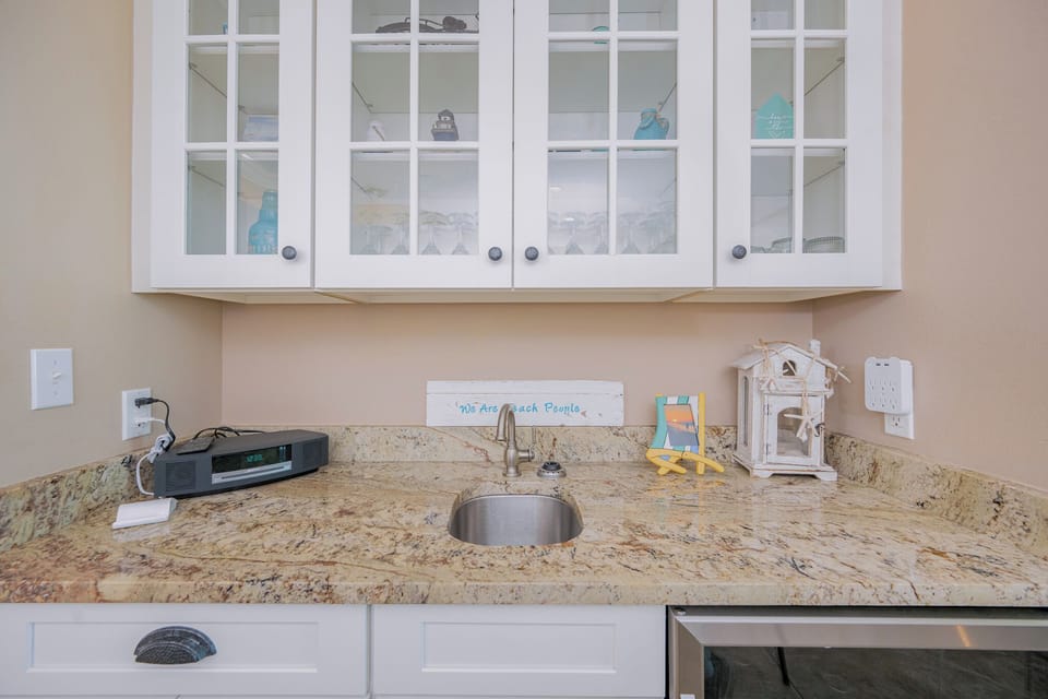 Enjoy sipping cocktails from the wet bar while sharing laughs and creating memories with family