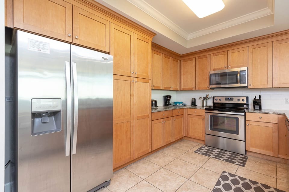 Create delicious meals in this spacious kitchen featuring stainless appliances and a welcoming layout