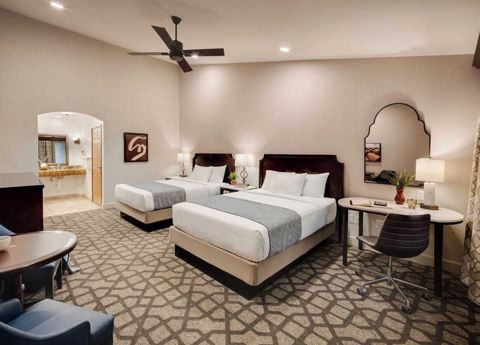 Premium bedding, down comforters, pillowtop beds, in-room safe