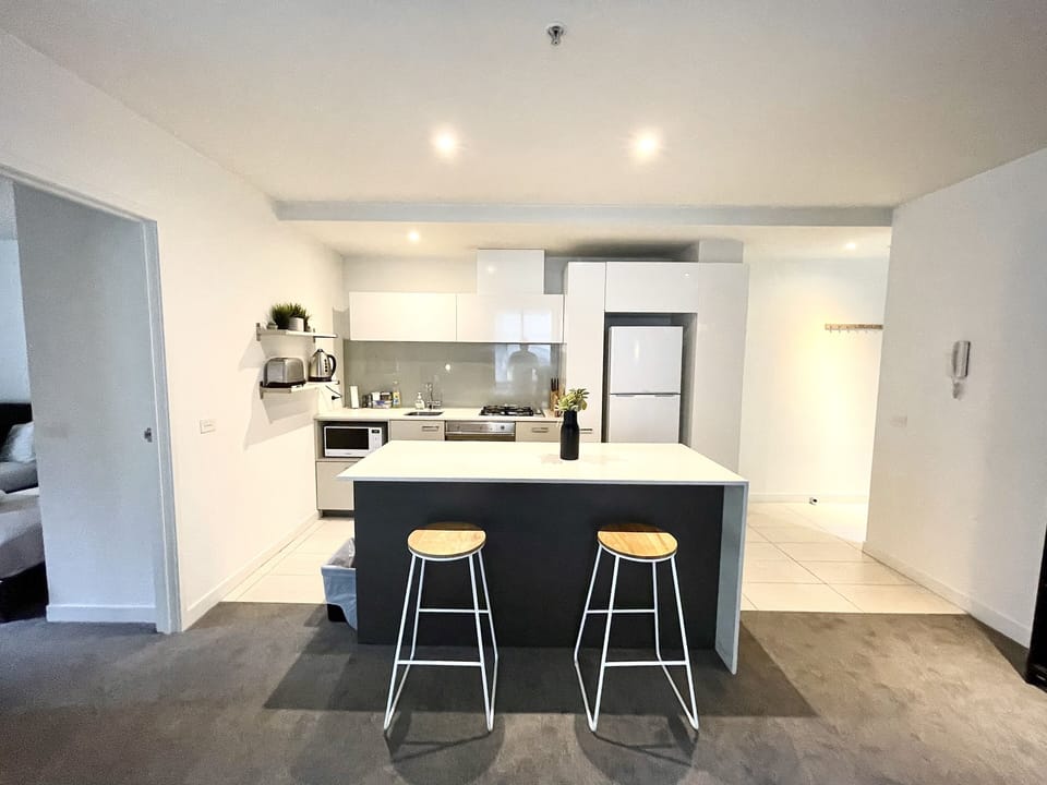 Family Apartment, 2 Bedrooms, Balcony, City View | Living area | Flat-screen TV