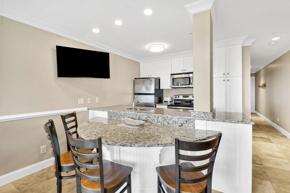 Kitchen/dining - “This open-concept kitchen and dining space has been recently updated and offers stylish comfort for entertaining and everyday living.”