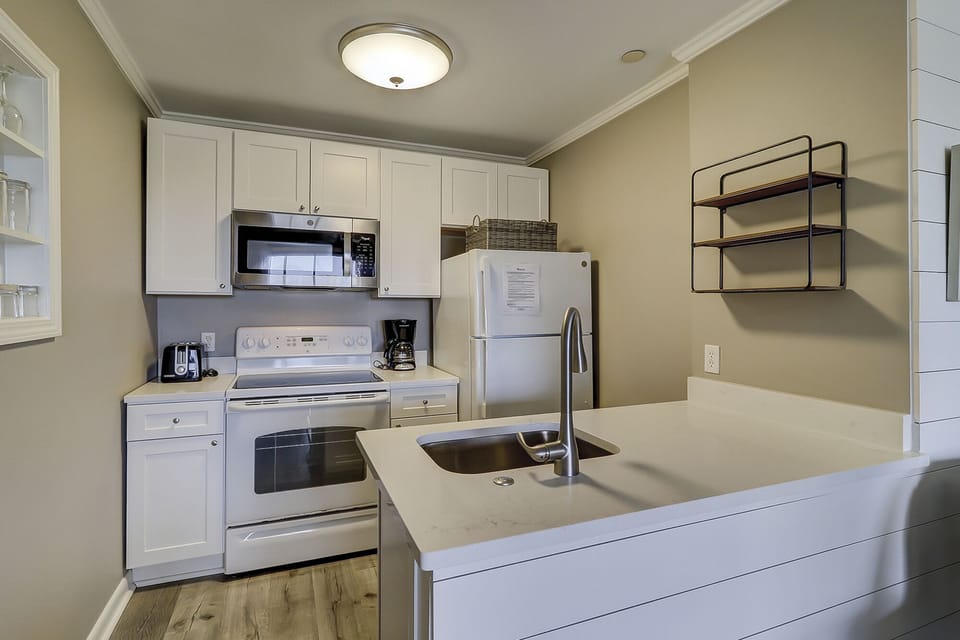 Ocean Dunes Villa 119 - Kitchen - The well-equipped kitchen will meet your every cooking need.