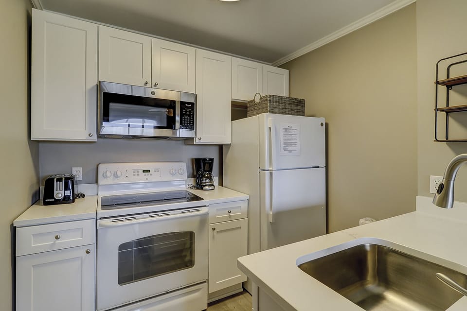 Ocean Dunes Villa 119 - Kitchen - This Oceanfront villa has all the kitchen appliances needed for your family meals.