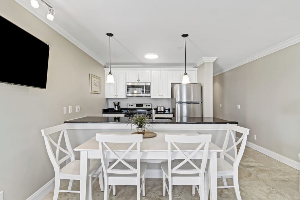 Kitchen/dining - Modern kitchen with seating for casual dining.