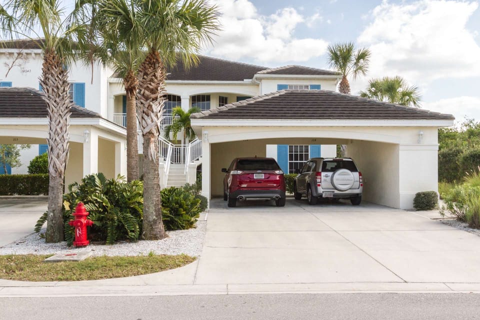 The end unit, first floor condo includes one assigned covered parking space, and one assigned driveway space.