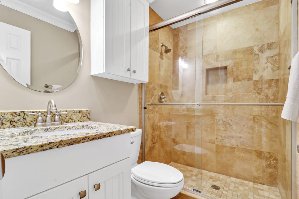 Bathroom - This bathroom has a lovely walk-in shower and beautiful vanity