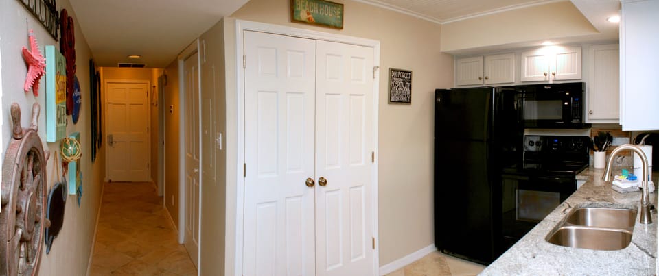 Storage closet in the well equipped kitchen.

