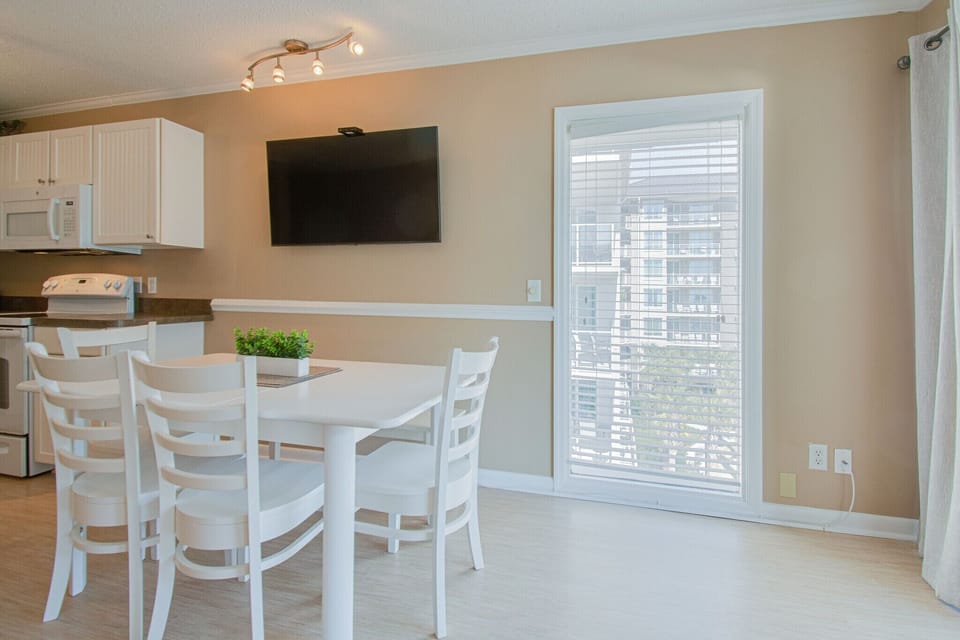 Ocean Dunes 401 -   Dining Area - Dinning room near kitchen with balcony with an ocean view.