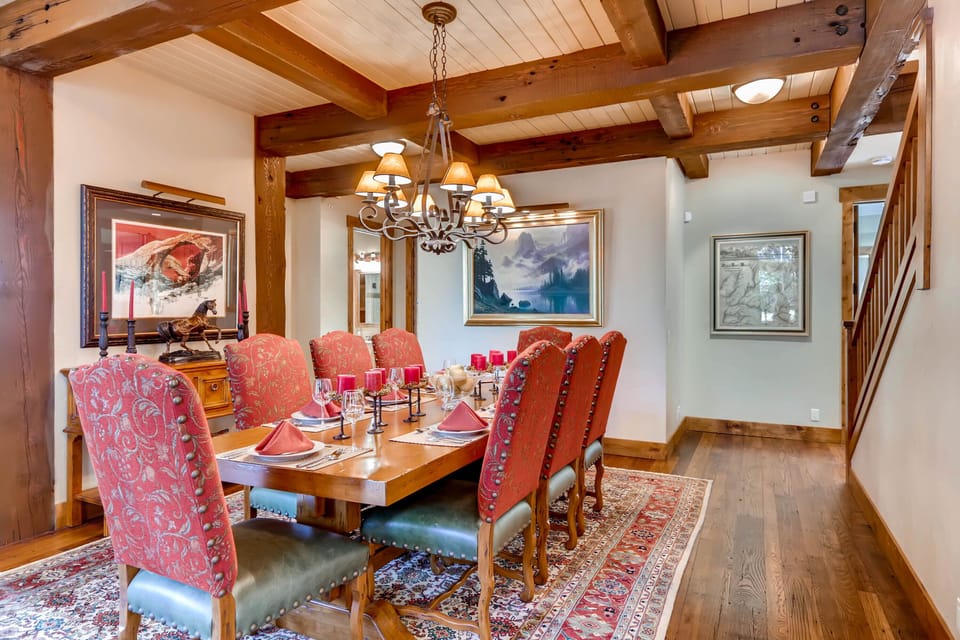 Perfectly appointed dining room, hardwood floors and ornate large area accent rug