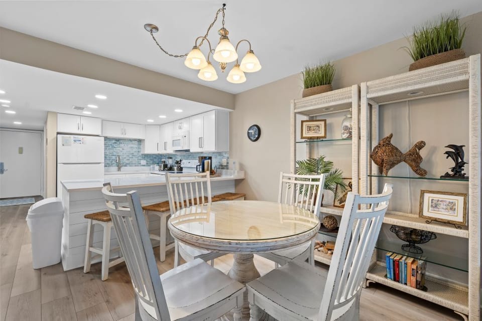Your open dining area flows beautifully into the modern kitchen, creating the perfect space for memorable meals together.