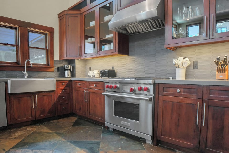 Vacation rental kitchen with stainless steel appliances.