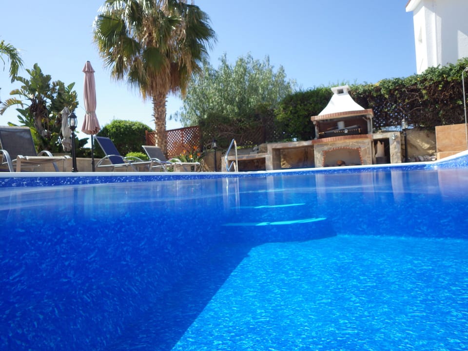 A gorgeous pool -  even better it's heated early and late season!