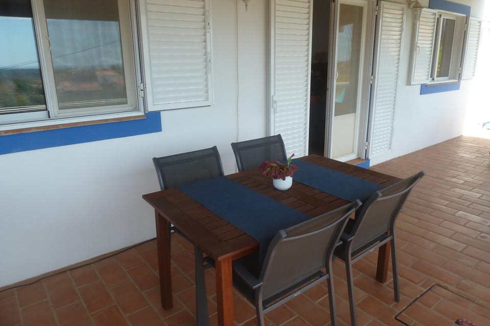 Dining outside on the covered terrace