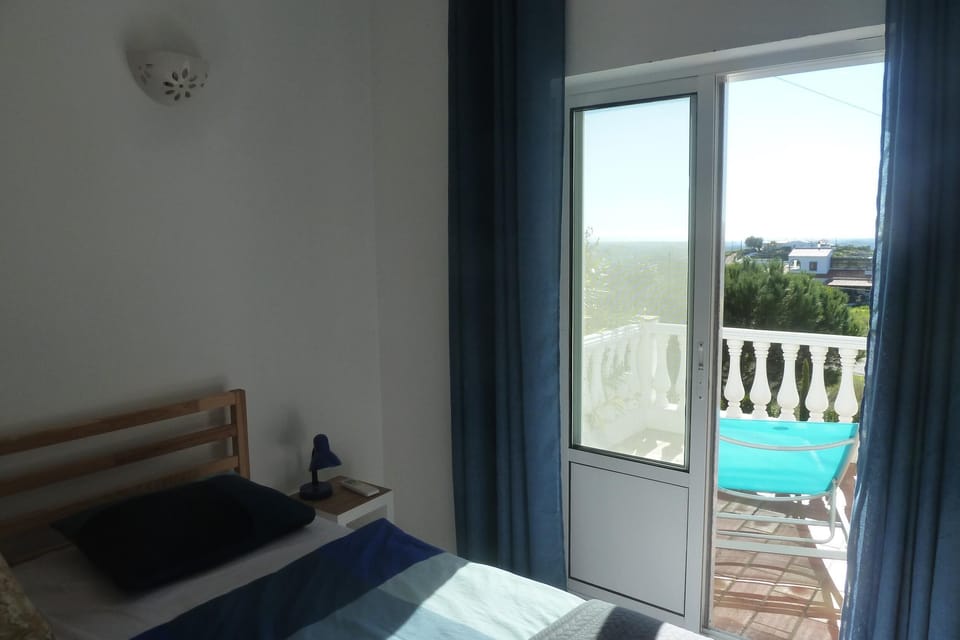 Bedroom with terrace door