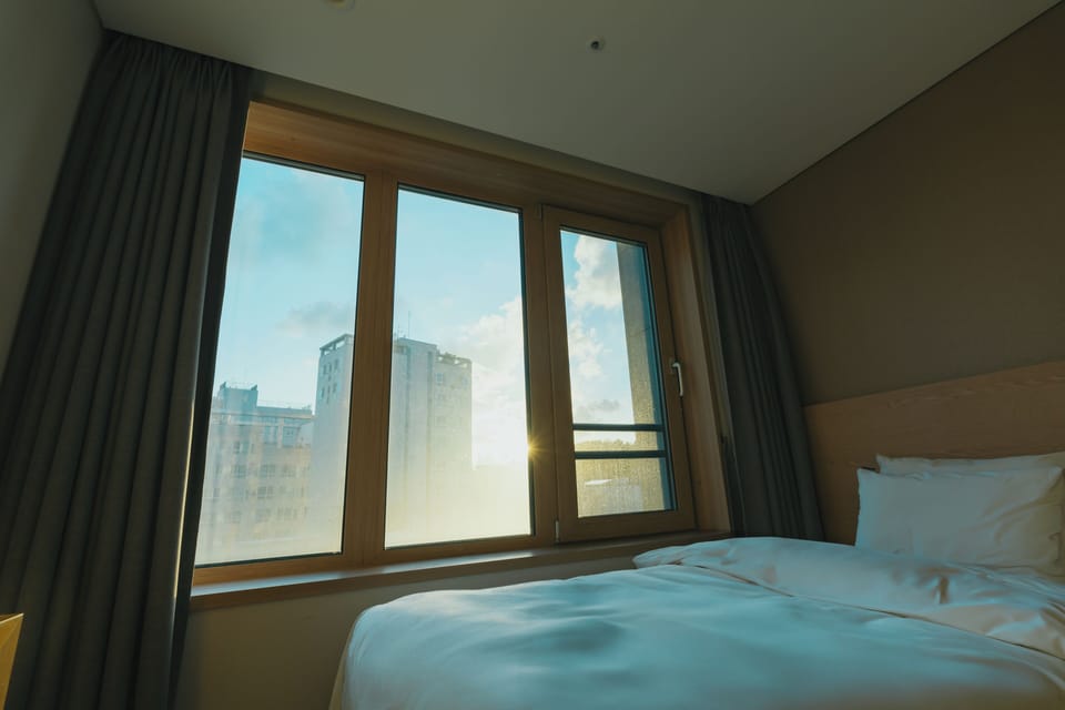 Lumia Twin | Premium bedding, blackout drapes, soundproofing, iron/ironing board