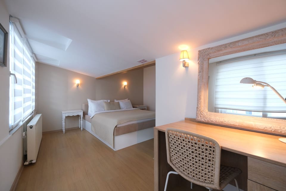 Apartment, 3 Bedrooms, Terrace, Sea View | In-room safe, desk, soundproofing, iron/ironing board (on request)