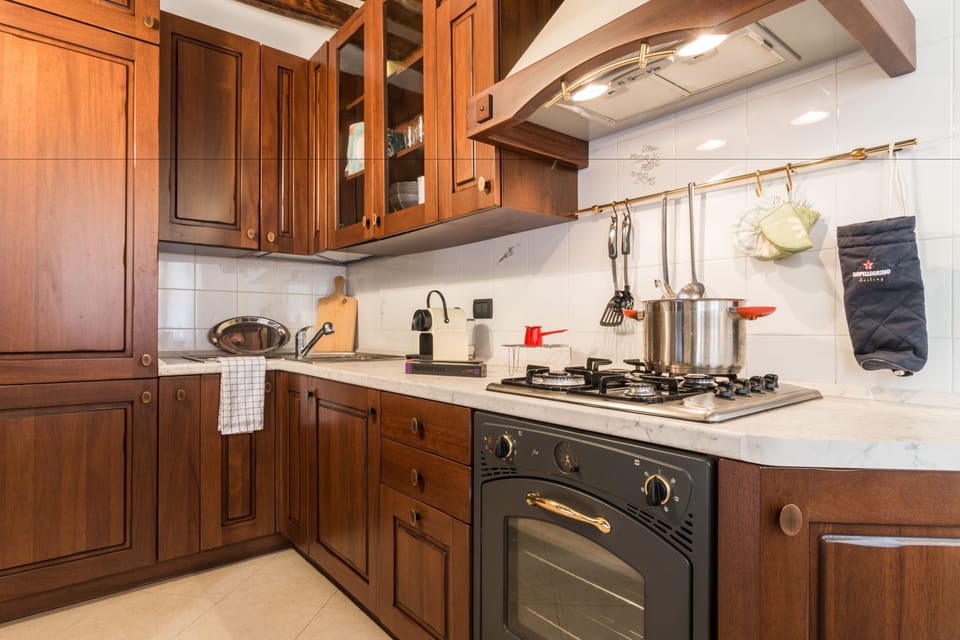 Apartment, 1 Bedroom | Private kitchen | Full-size fridge, oven, stovetop, dishwasher