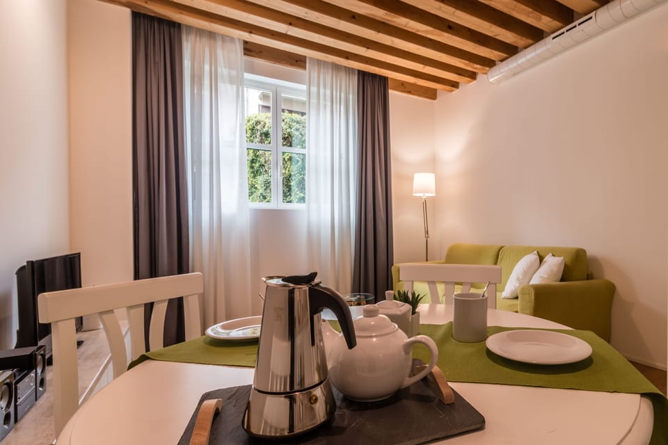 Apartment, 1 Bedroom | Living area | Flat-screen TV