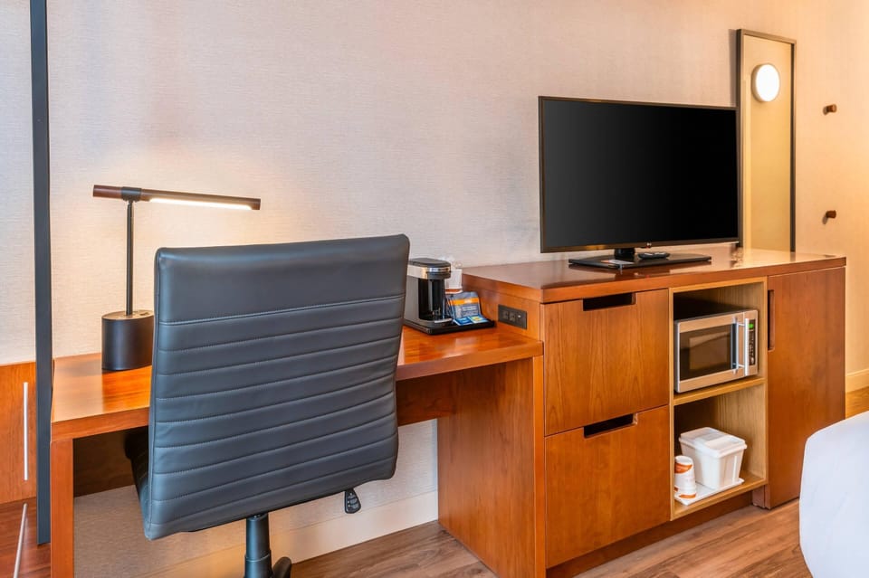 Room, 1 King Bed, Non Smoking, Ground Floor Pet-Friendly | Pillowtop beds, desk, laptop workspace, blackout drapes