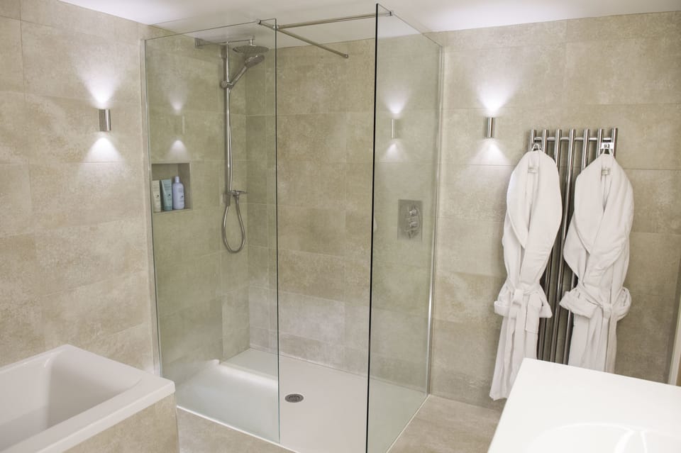 Superior Double Room | Bathroom | Designer toiletries, hair dryer, bathrobes, slippers