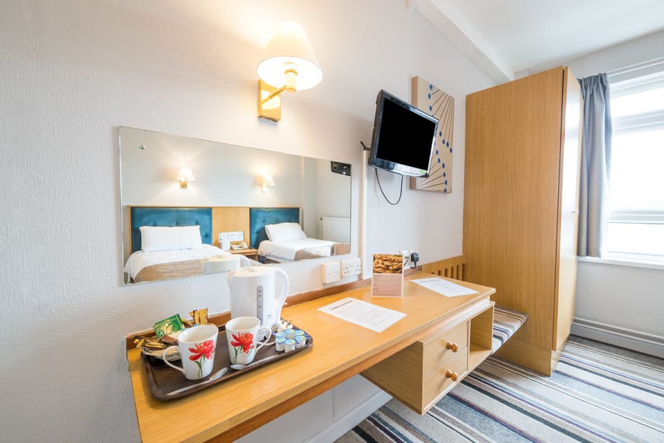 Desk, bed sheets