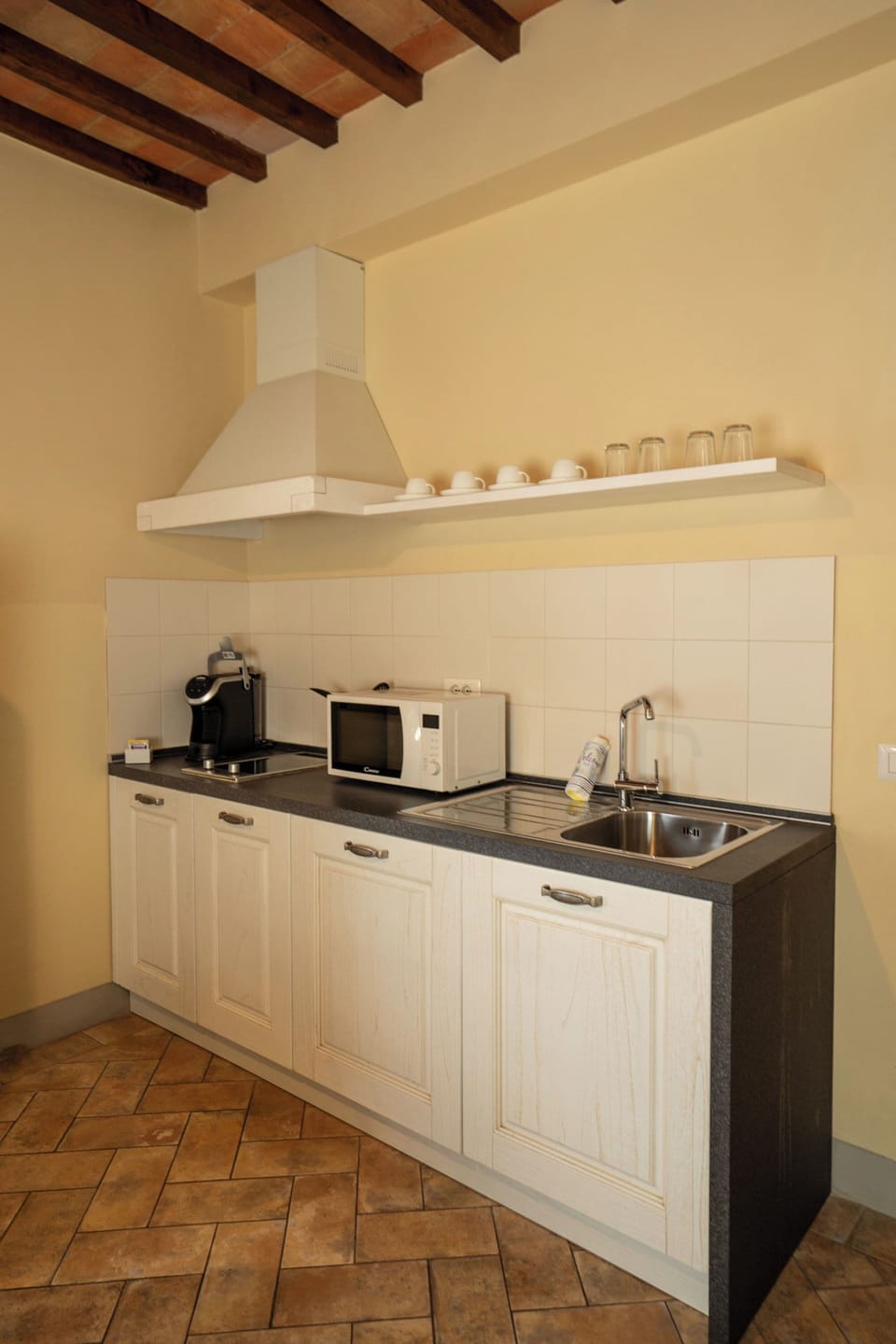Apartment, 1 Bedroom | Private kitchen | Coffee/tea maker, electric kettle, highchair