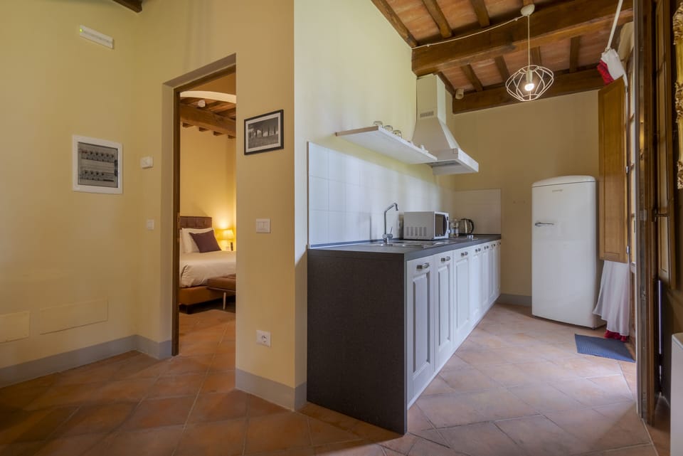 Apartment, 2 Bedrooms, Kitchen | Private kitchen | Coffee/tea maker, electric kettle, highchair