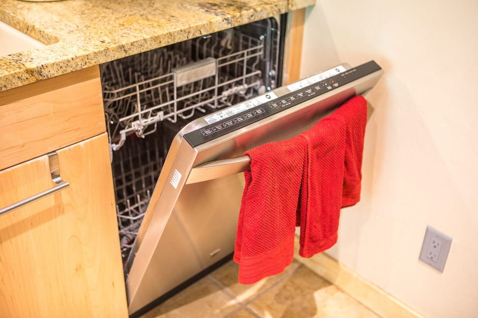 Make sure to use white vinegar (provided) when doing dishes due to hard water!