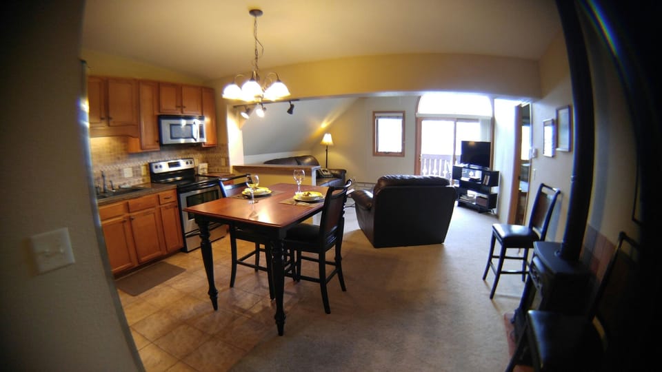 kitchen table with living room in the background.