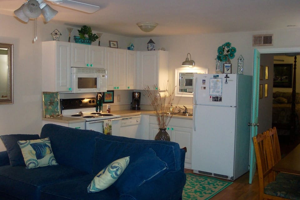 Full kitchen with all but your groceries. there's plenty of spices and cookware.