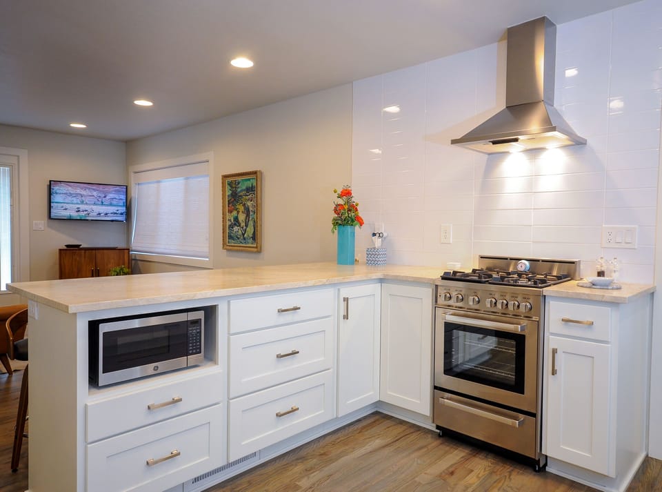 Gas Stove/Oven, Microwave and Quartzite counter tops