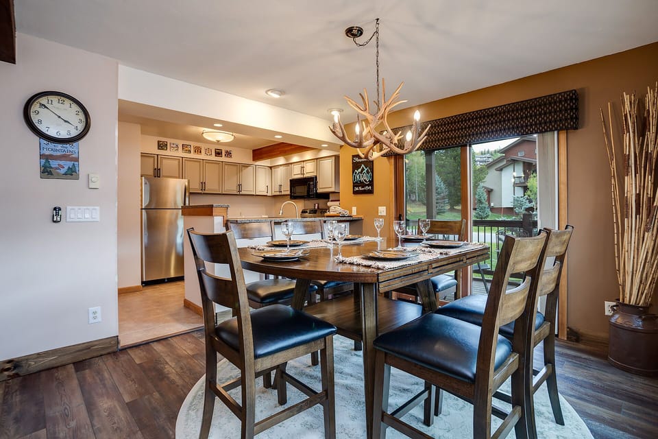 Your elegant dining space flows seamlessly into a fully equipped kitchen, perfect for memorable meals with loved ones.