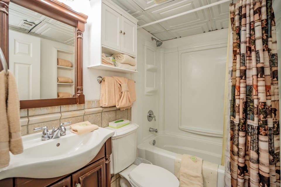 Step into your private bathroom where fluffy towels and thoughtful touches await. Bright, clean, and stocked with everything you'll need to freshen up after a day of exploring.