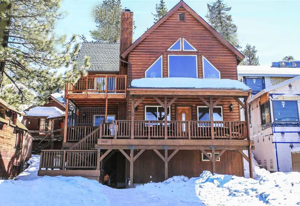 Snow covered Big Bear Cool Cabins, Boulder Bay Park Lakefront front