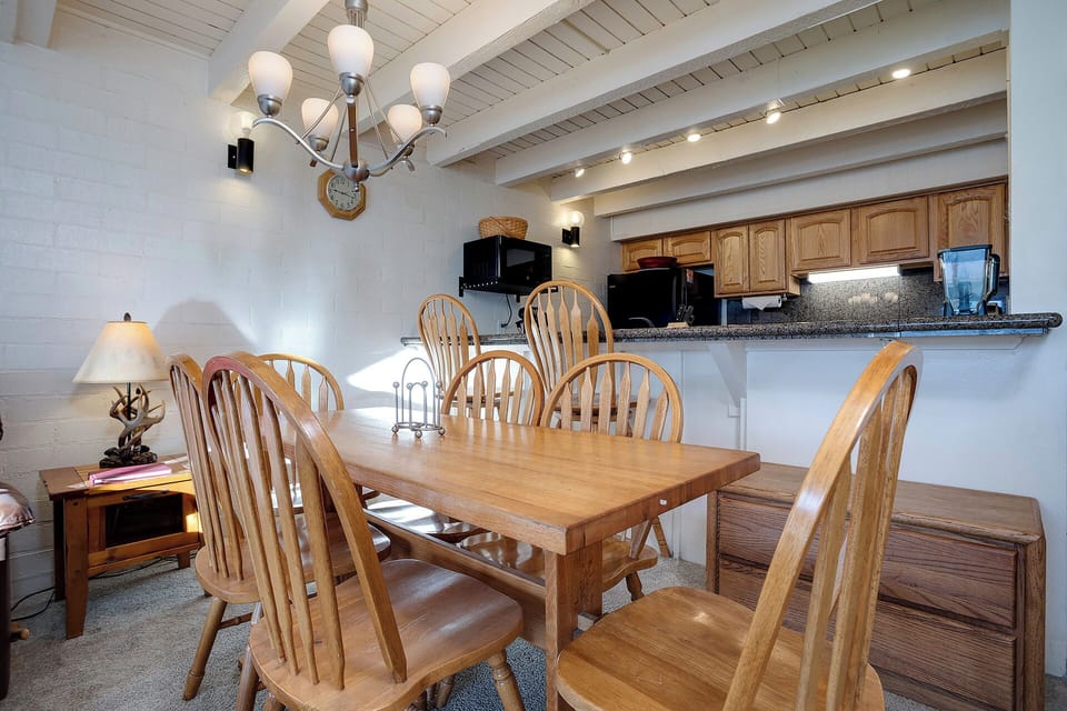 Gather around your spacious dining table for memorable meals, with a fully-equipped kitchen ready for your culinary adventures.