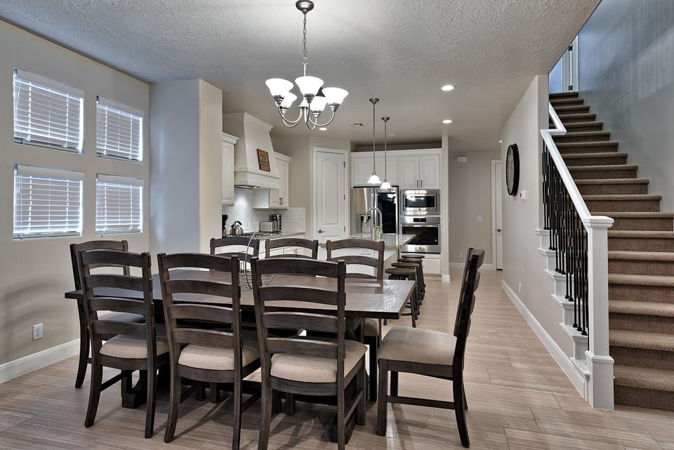 Dining Table & Kitchen View - Share memories and stories while enjoying a family style meal around the Dining Table.