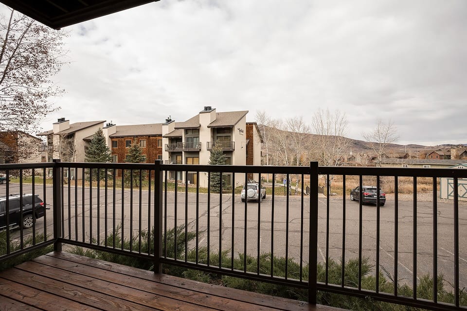 Step onto your private balcony and take in the peaceful mountain views while enjoying your morning coffee in this serene setting.